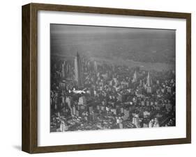 Howard Hughes Lockheed 14 Super Electra over New York City-null-Framed Photographic Print