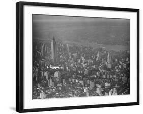 Howard Hughes Lockheed 14 Super Electra over New York City-null-Framed Photographic Print