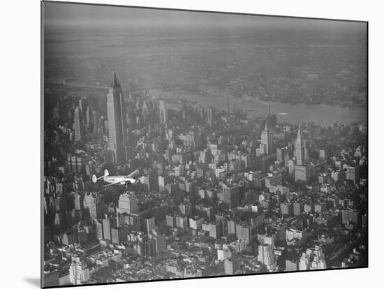 Howard Hughes Lockheed 14 Super Electra over New York City-null-Mounted Photographic Print