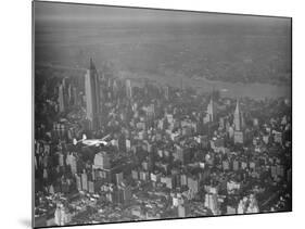 Howard Hughes Lockheed 14 Super Electra over New York City-null-Mounted Photographic Print