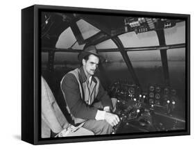 Howard Hughes Sitting at the Controls of His 200 Ton Flying Boat Called the "Spruce Goose"-J^ R^ Eyerman-Framed Stretched Canvas