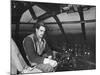 Howard Hughes Sitting at the Controls of His 200 Ton Flying Boat Called the "Spruce Goose"-J^ R^ Eyerman-Mounted Premium Photographic Print