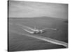 Howard Hughes' Spruce Goose Taxiing across Water-null-Stretched Canvas