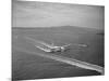 Howard Hughes' Spruce Goose Taxiing across Water-null-Mounted Photographic Print