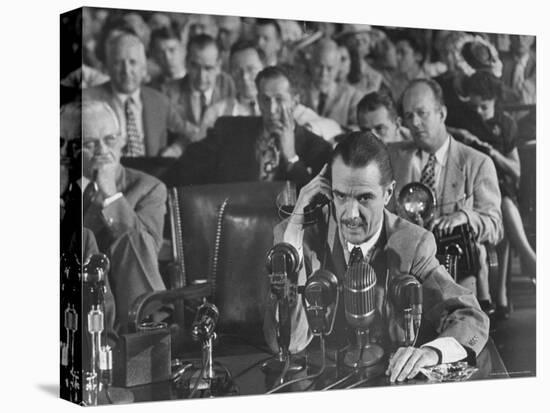 Howard R. Hughes Testifying at Hearing Before the Senate War Investigation Committee-Martha Holmes-Stretched Canvas