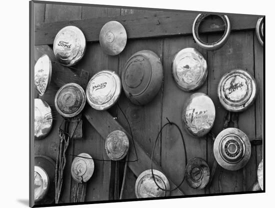 Hubcaps, c. 1940-Brett Weston-Mounted Photographic Print