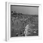 Huge Crowd Gathered in the Surf and at the Beach in Front of Coney Island Amusement Park-Marie Hansen-Framed Premium Photographic Print