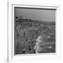 Huge Crowd Gathered in the Surf and at the Beach in Front of Coney Island Amusement Park-Marie Hansen-Framed Photographic Print