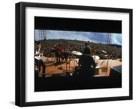 Huge Crowd Listening to a Band Onstage at the Woodstock Music and Art Festival-Bill Eppridge-Framed Premium Photographic Print