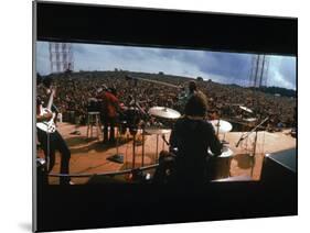 Huge Crowd Listening to a Band Onstage at the Woodstock Music and Art Festival-Bill Eppridge-Mounted Photographic Print