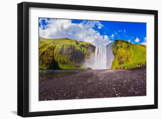 Huge Picturesque Waterfall Flowing from under a Giant Glacier. Horse Tour to the Waterfall Skogafol-kavram-Framed Photographic Print