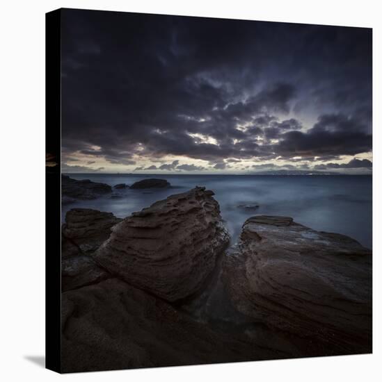 Huge Rocks on the Shore of a Sea Against Stormy Clouds, Sardinia, Italy-null-Stretched Canvas