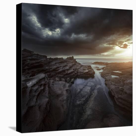 Huge Rocks on the Shore of a Sea Against Stormy Clouds, Sardinia, Italy-null-Stretched Canvas