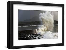 Huge Waves Crash Against a Stone Jetty at Criccieth, Gwynedd, Wales, United Kingdom, Europe-Graham Lawrence-Framed Photographic Print