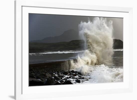 Huge Waves Crash Against a Stone Jetty at Criccieth, Gwynedd, Wales, United Kingdom, Europe-Graham Lawrence-Framed Photographic Print