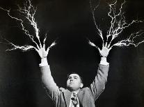 Man with Lightning Shooting from Fingers (B&W)-Hulton Archive-Photographic Print