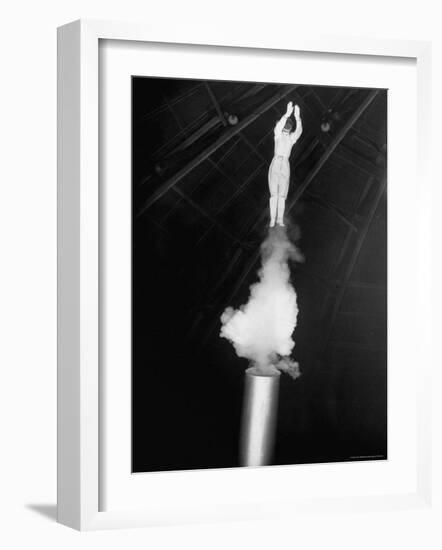 Human Cannonball Egle Zacchini Emerging From Barrel of Cannon During Her Circus Act-Cornell Capa-Framed Photographic Print