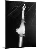 Human Cannonball Egle Zacchini Emerging From Barrel of Cannon During Her Circus Act-Cornell Capa-Mounted Photographic Print