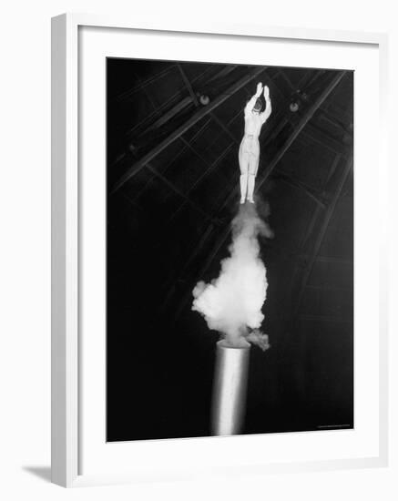 Human Cannonball Egle Zacchini Emerging From Barrel of Cannon During Her Circus Act-Cornell Capa-Framed Photographic Print