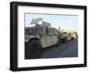 Humvees Sit on the Pier at Morehead City, North Carolina, Awaiting Deployment-null-Framed Photographic Print