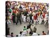 Hundreds Look at a Bull That Gored a Reveler During the Running of the Bulls at San Fermin Fiestas -null-Stretched Canvas