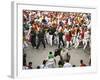 Hundreds Look at a Bull That Gored a Reveler During the Running of the Bulls at San Fermin Fiestas -null-Framed Photographic Print