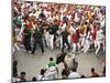 Hundreds Look at a Bull That Gored a Reveler During the Running of the Bulls at San Fermin Fiestas -null-Mounted Photographic Print