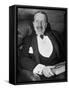 Hungarian Prince George Festetics Clad in Tuxedo While Sitting in Chair at Festetics Castle-Margaret Bourke-White-Framed Stretched Canvas