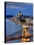 Hungary, Budapest, Parliament Buildings, Chain Bridge and River Danube-Michele Falzone-Stretched Canvas