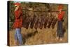 Hunters Carrying Giant Grasshoppers-null-Stretched Canvas