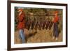 Hunters Carrying Giant Grasshoppers-null-Framed Art Print