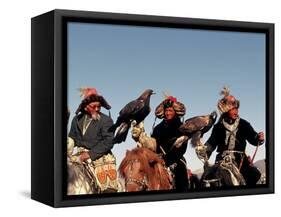 Hunters from Sagsai Sum, Bechik, Tek and Khalbek, Golden Eagle Festival, Mongolia-Amos Nachoum-Framed Stretched Canvas