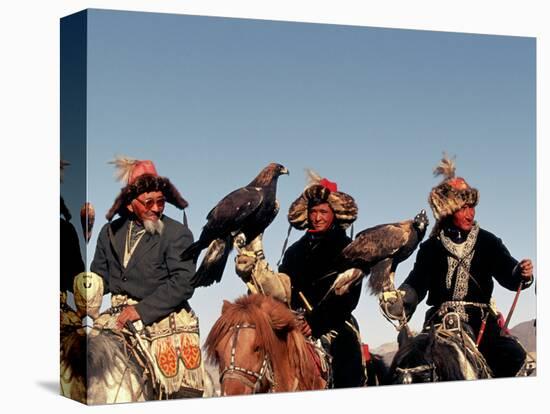 Hunters from Sagsai Sum, Bechik, Tek and Khalbek, Golden Eagle Festival, Mongolia-Amos Nachoum-Stretched Canvas