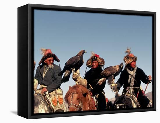Hunters from Sagsai Sum, Bechik, Tek and Khalbek, Golden Eagle Festival, Mongolia-Amos Nachoum-Framed Stretched Canvas