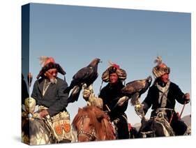 Hunters from Sagsai Sum, Bechik, Tek and Khalbek, Golden Eagle Festival, Mongolia-Amos Nachoum-Stretched Canvas