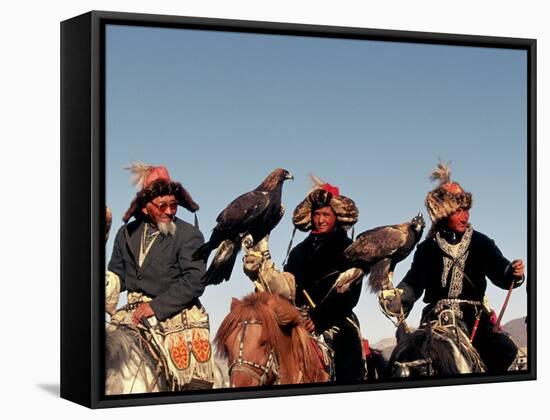 Hunters from Sagsai Sum, Bechik, Tek and Khalbek, Golden Eagle Festival, Mongolia-Amos Nachoum-Framed Stretched Canvas