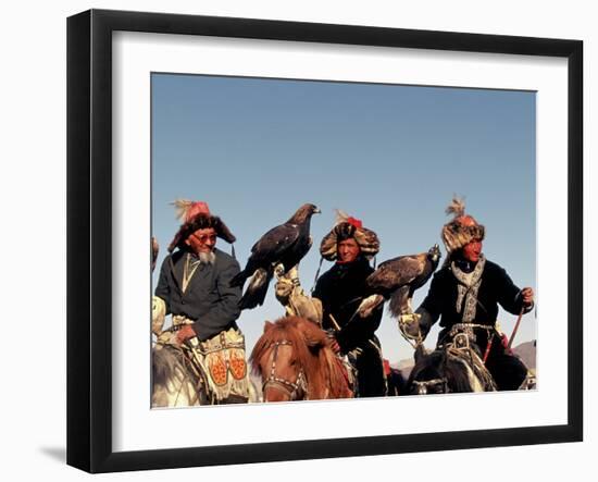 Hunters from Sagsai Sum, Bechik, Tek and Khalbek, Golden Eagle Festival, Mongolia-Amos Nachoum-Framed Premium Photographic Print