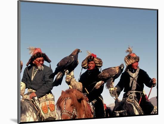 Hunters from Sagsai Sum, Bechik, Tek and Khalbek, Golden Eagle Festival, Mongolia-Amos Nachoum-Mounted Photographic Print