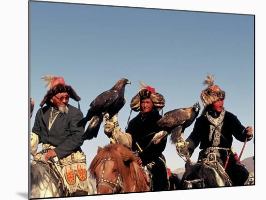 Hunters from Sagsai Sum, Bechik, Tek and Khalbek, Golden Eagle Festival, Mongolia-Amos Nachoum-Mounted Photographic Print