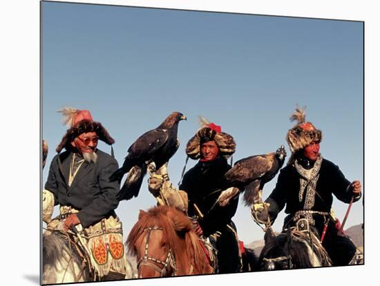 Hunters from Sagsai Sum, Bechik, Tek and Khalbek, Golden Eagle Festival, Mongolia-Amos Nachoum-Mounted Photographic Print