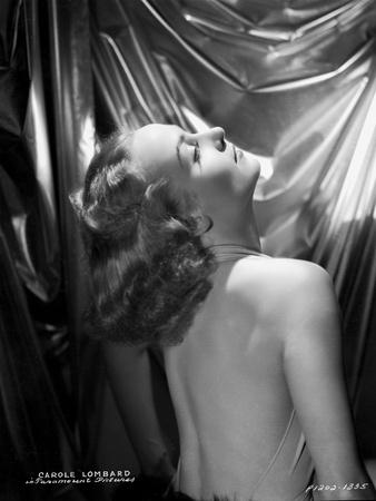 Carole Lombard wearing a Backless Dress