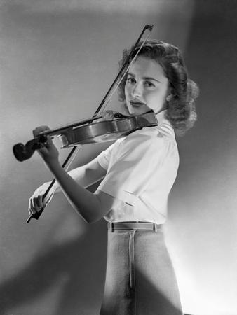 Olivia DeHavilland Playing Violin in Black and White