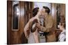 Husband and Wife Kissing Goodbye-William P. Gottlieb-Stretched Canvas