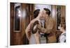 Husband and Wife Kissing Goodbye-William P. Gottlieb-Framed Photographic Print