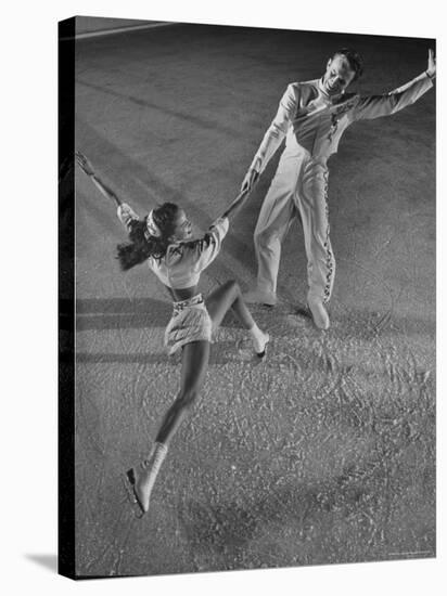 Husband and Wife Skating Team Narena Greer and Richard Norris Skating with "The Ice Follies"-Gjon Mili-Stretched Canvas