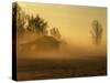 Hut and Mist at Sunrise with Ground Fog-null-Stretched Canvas