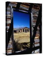 Hut Framed by Window of Burnt Log Cabin, Wind River Country, Lander, USA-Brent Winebrenner-Stretched Canvas