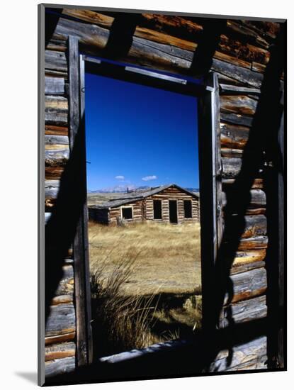 Hut Framed by Window of Burnt Log Cabin, Wind River Country, Lander, USA-Brent Winebrenner-Mounted Photographic Print