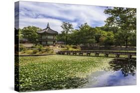 Hyangwonjeong Pavilion and Chwihyanggyo Bridge over Water Lily Filled Lake in Summer, South Korea-Eleanor Scriven-Stretched Canvas