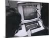 Ibm Programmers Work at a Cathode Ray Monitor with a Touch-Screen Pointer, 1980-null-Mounted Photo